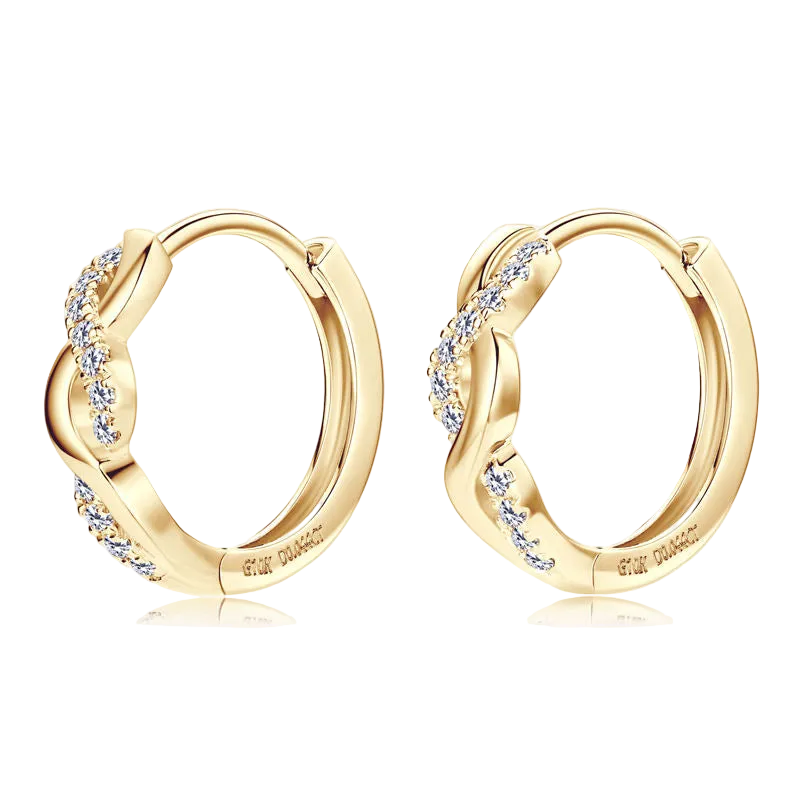 Gold hoop earrings with small diamonds on a white background